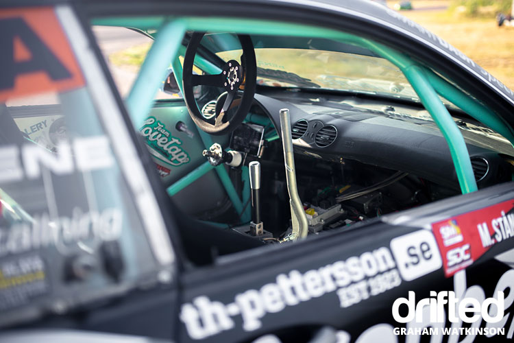 drift car interior with racing steering wheel