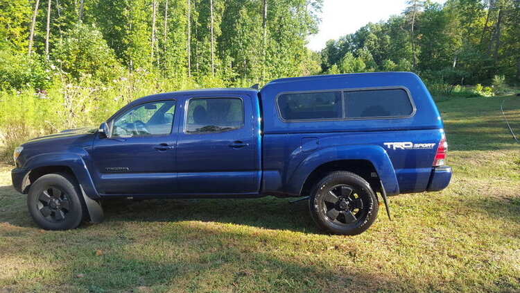 snug top tacoma camper shell