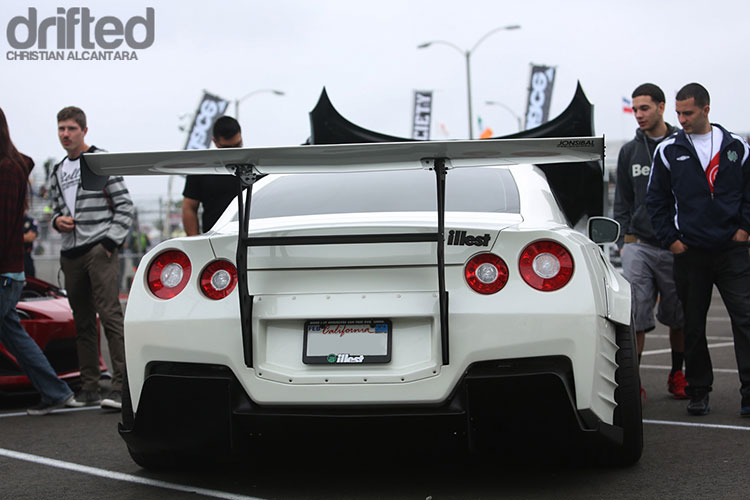 white r35 gtr parked with vr38dett